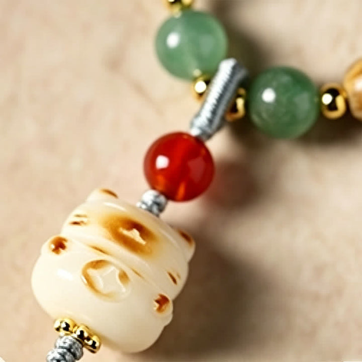 Buddha Stones Mala ethnique rétro tissée à la main en bois de santal vert, symbole de sérénité et de chat - image 16