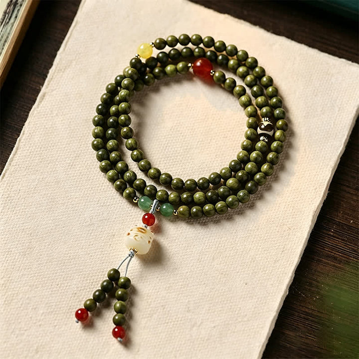Buddha Stones Mala ethnique rétro tissée à la main en bois de santal vert, symbole de sérénité et de chat - Bois de santal vert (Énergie calme ♥ Équilibre spirituel) - image 0