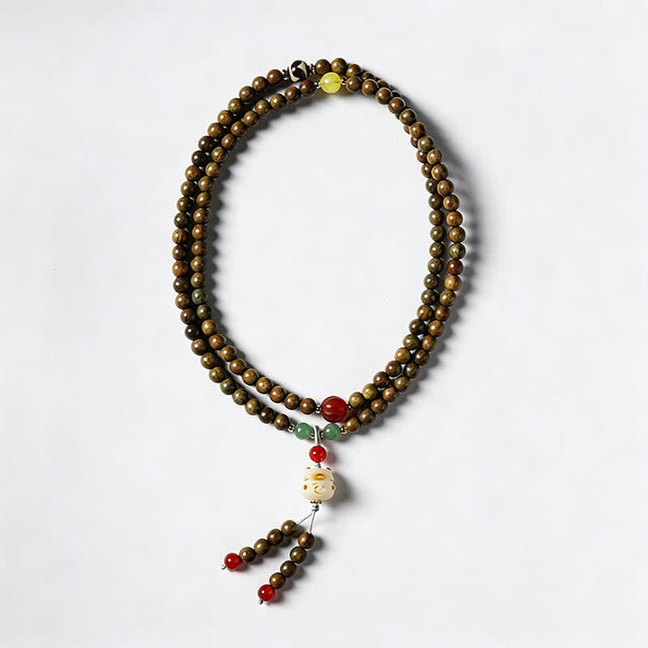 Buddha Stones Mala ethnique rétro tissée à la main en bois de santal vert, symbole de sérénité et de chat - image 6
