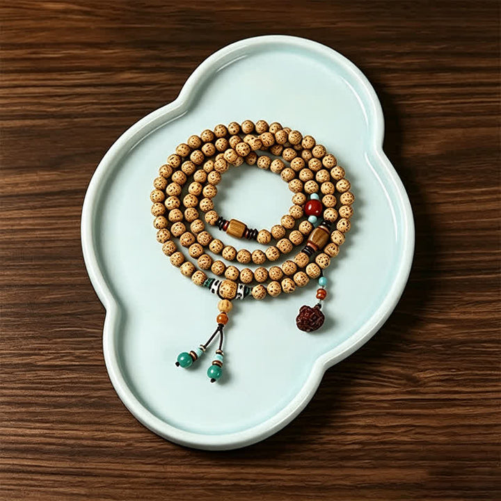 Buddha Stones Mala rond de 108 perles, orné de graines de lotus, de graines de Bodhi et d'étoiles, de lunes et de graines, fabriqué à la main. - image 1
