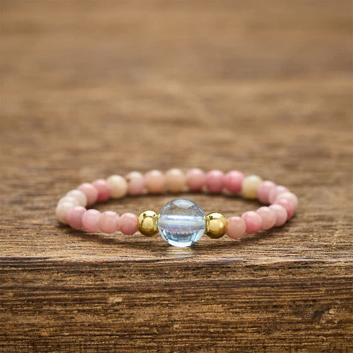 Buddha Stones Anneau élastique de guérison avec mini perles de 2 mm en rhodonite naturelle, aigue-marine, topaze et quartz rose - Rhodonite naturelle (couleur variable) + Aigue-marine naturelle (couleur variable) (2 mm + 4 mm) - image 0