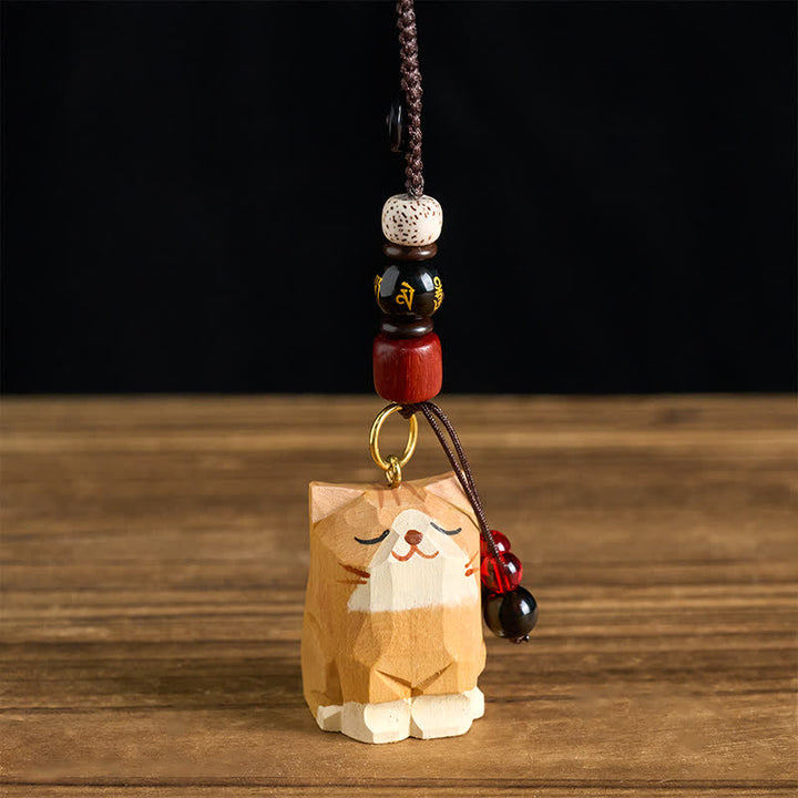 Buddha Stones Porte-clés en bois sculpté à la main représentant un chat Om Mani Padme Hum et la paix - image 0