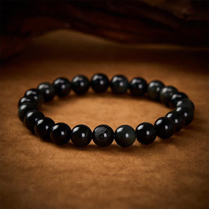 Buddha Stones Bracelet rond en obsidienne arc-en-ciel Yin Yang Balance, perles rondes - Obsidienne arc-en-ciel (changements de couleur selon la lumière) - 8 mm - image 0