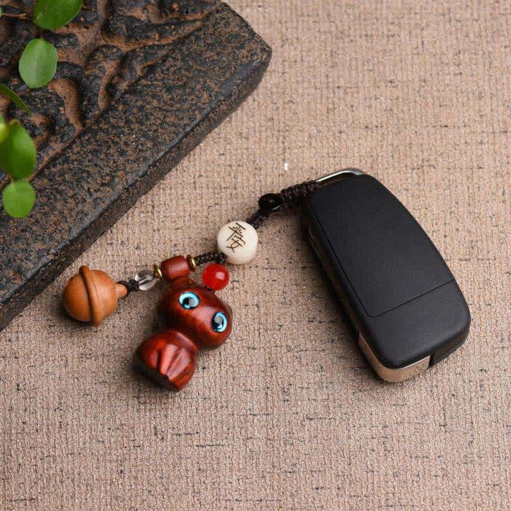 Buddha Stones Porte-clés clochette de protection pour chat sculptés à la main en bois d'ébène et en bois de santal rouge - image 4