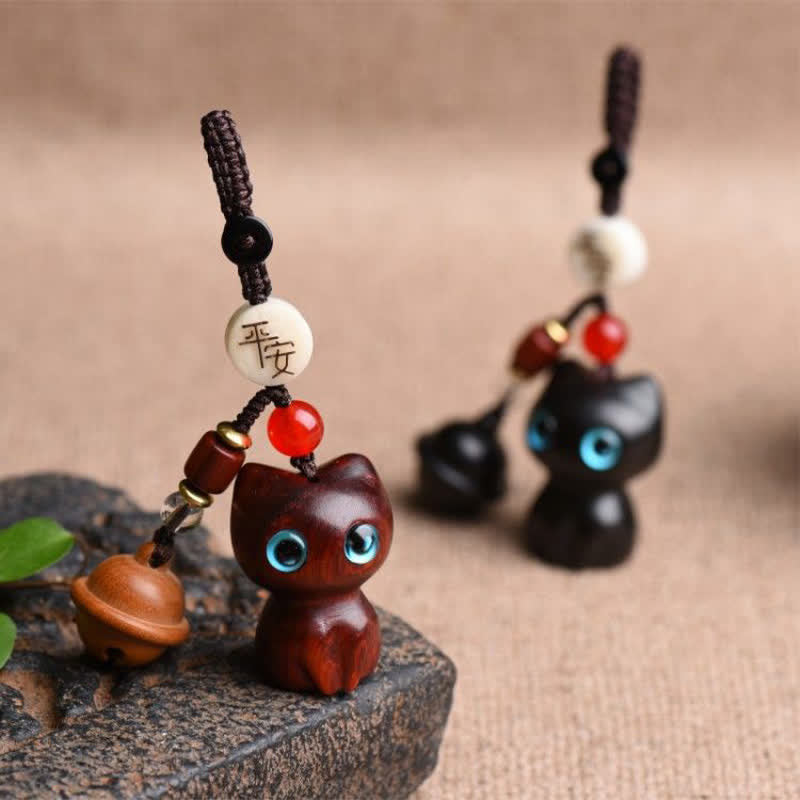 Buddha Stones Porte-clés clochette de protection pour chat sculptés à la main en bois d'ébène et en bois de santal rouge - image 1