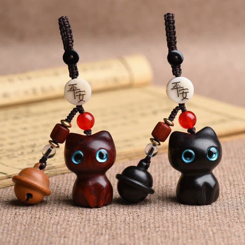 Buddha Stones Porte-clés clochette de protection pour chat sculptés à la main en bois d'ébène et en bois de santal rouge - image 0