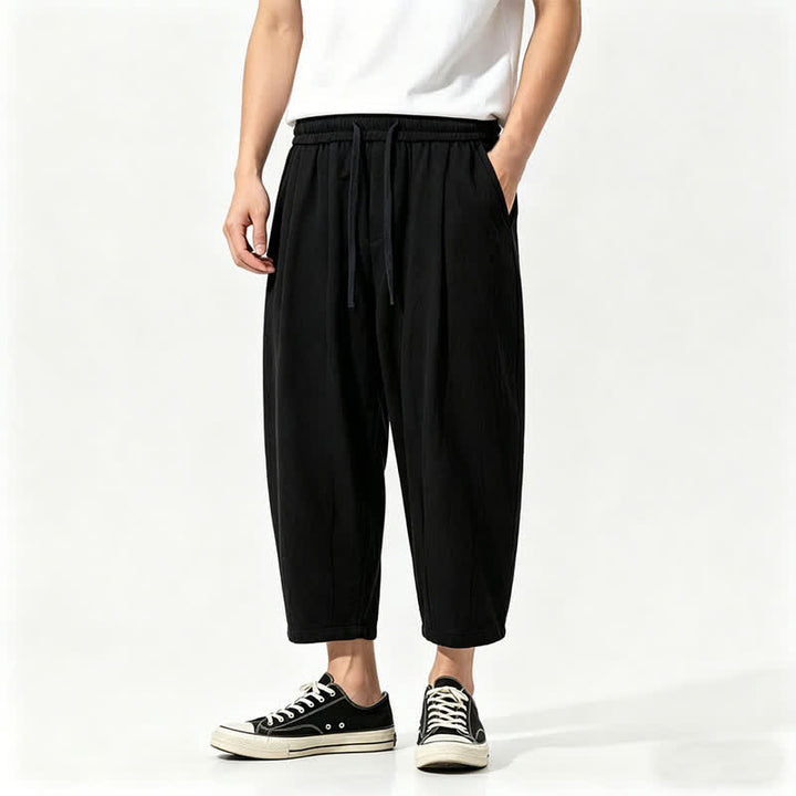 Buddha Stones Pantalon Capri décontracté d'été en coton uni avec cordon de serrage et poches, style sarouel pour homme - Noir - US/UK/AU46，EU56 (5XL) - image 1