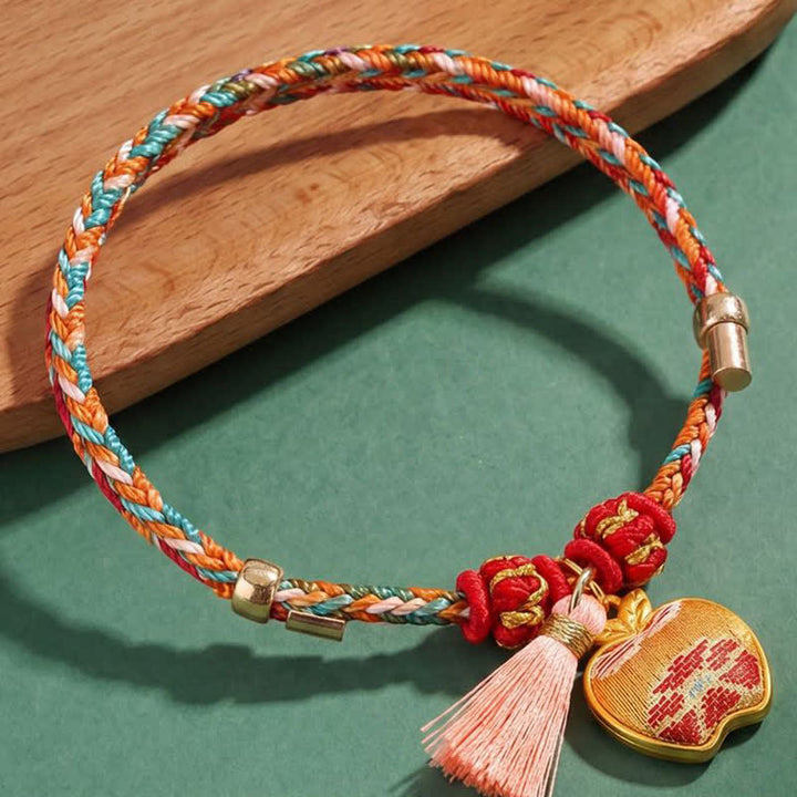 Buddha Stones Bracelet de protection tissé à la main en forme de calebasse avec porte-monnaie en forme de pomme et de cadenas chinois, orné d'un sac à monnaie en forme de pomme et de cinq couleurs. - image 2