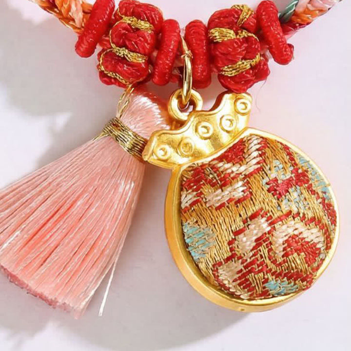 Buddha Stones Bracelet de protection tissé à la main en forme de calebasse avec porte-monnaie en forme de pomme et de cadenas chinois, orné d'un sac à monnaie en forme de pomme et de cinq couleurs. - image 19