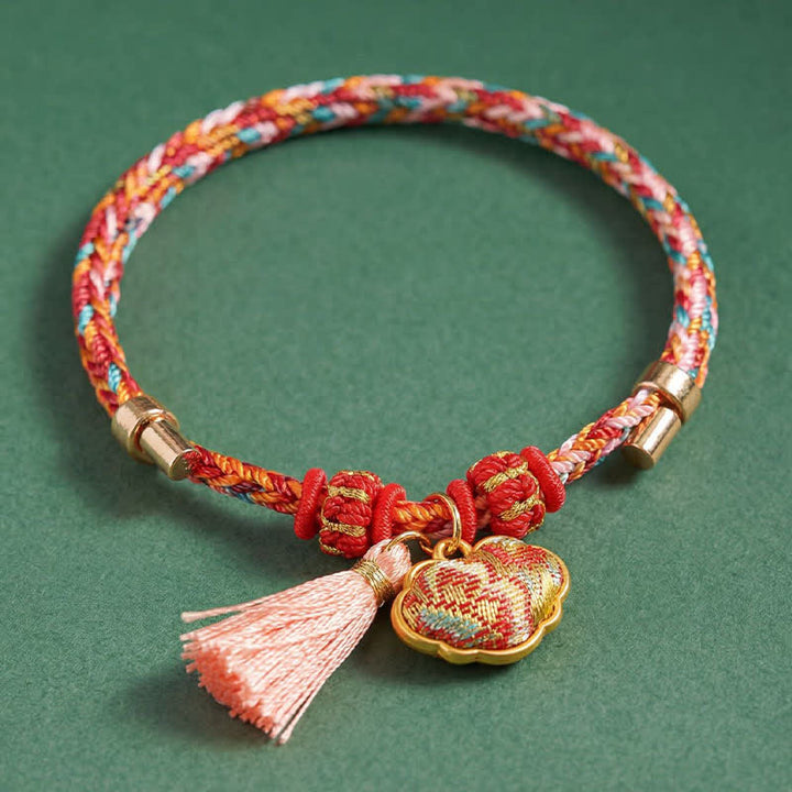 Buddha Stones Bracelet de protection tissé à la main en forme de calebasse avec porte-monnaie en forme de pomme et de cadenas chinois, orné d'un sac à monnaie en forme de pomme et de cinq couleurs. - image 57
