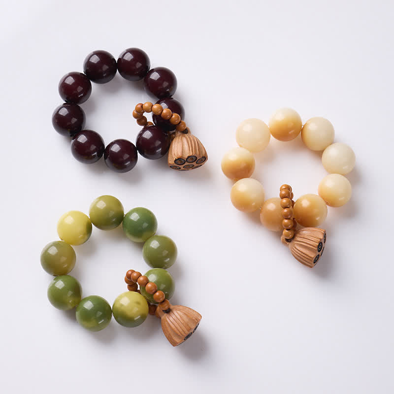 Buddha Stones Perles de méditation tactiles polies à la main, ornées de graines de Bodhi blanches et de capsules de lotus, pour un ancrage optimal. - image 1
