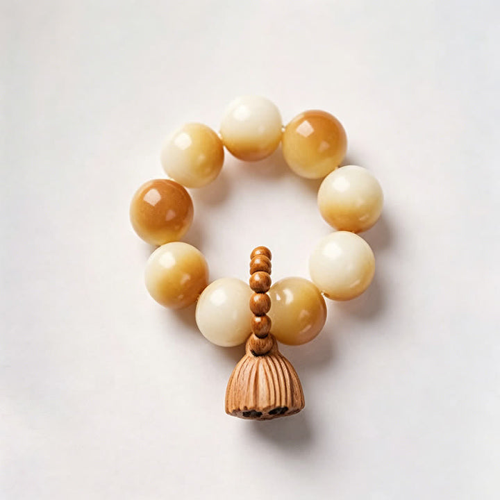 Buddha Stones Perles de méditation tactiles polies à la main, ornées de graines de Bodhi blanches et de capsules de lotus, pour un ancrage optimal. - Jaune clair - Graine de Bodhi blanche (Pureté ♥ Clarté) - image 2