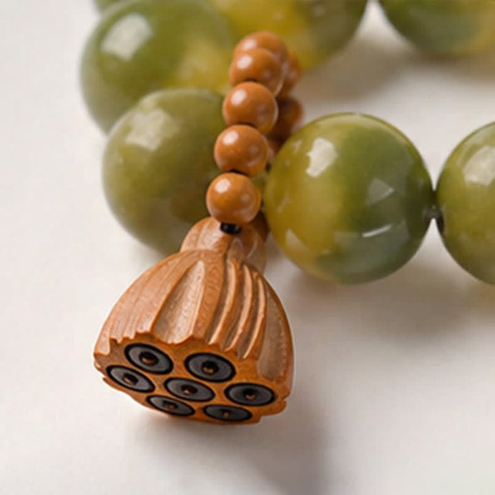 Buddha Stones Perles de méditation tactiles polies à la main, ornées de graines de Bodhi blanches et de capsules de lotus, pour un ancrage optimal. - image 15