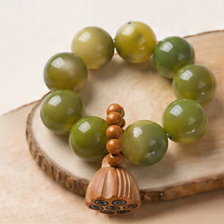 Buddha Stones Perles de méditation tactiles polies à la main, ornées de graines de Bodhi blanches et de capsules de lotus, pour un ancrage optimal. - image 12