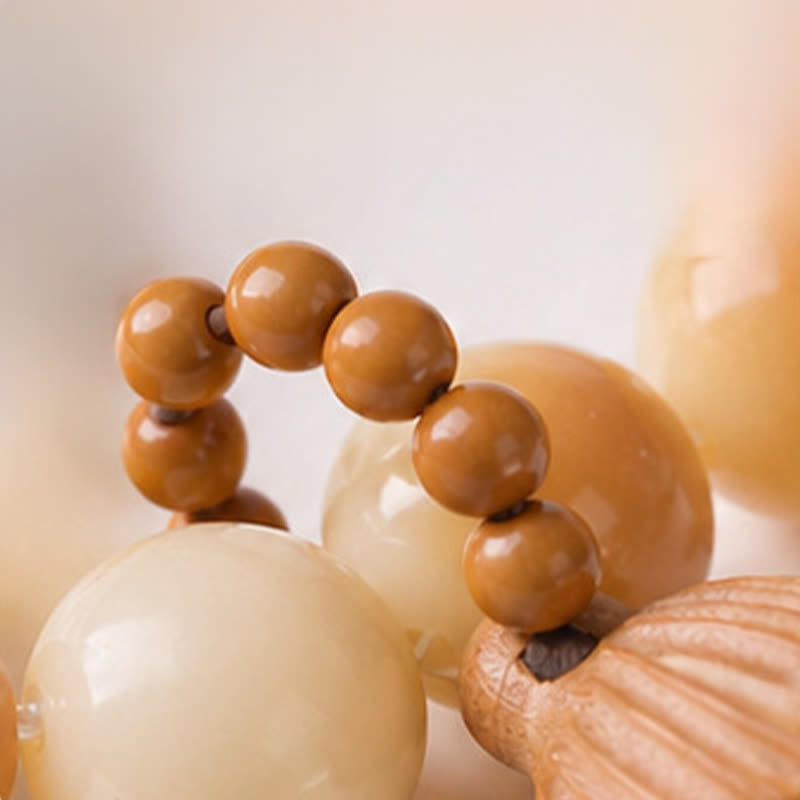 Buddha Stones Perles de méditation tactiles polies à la main, ornées de graines de Bodhi blanches et de capsules de lotus, pour un ancrage optimal. - image 8