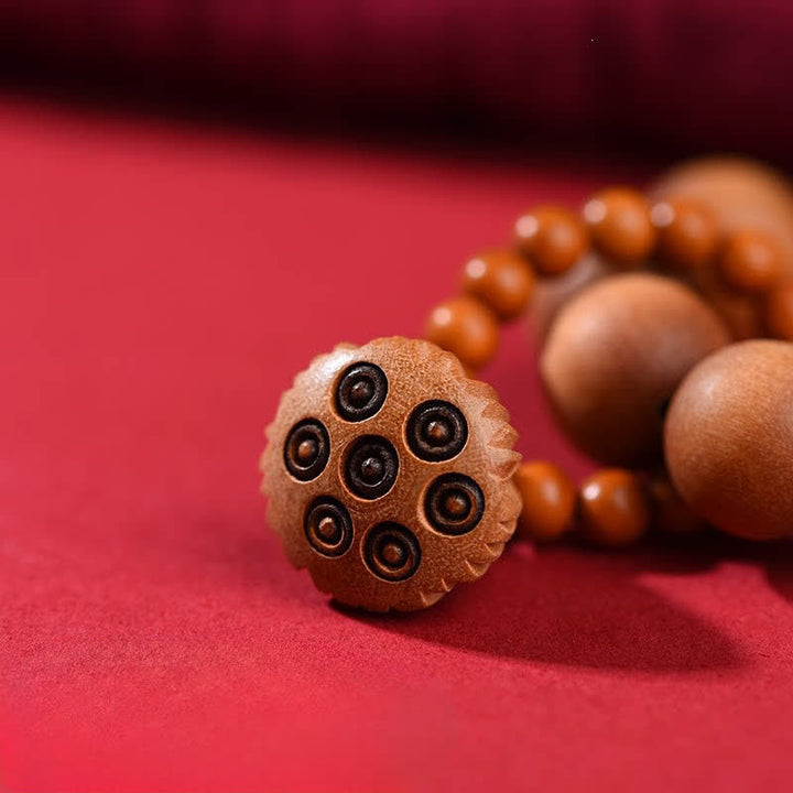 Buddha Stones Perles de méditation tactiles en bois de pêcher et gousse de lotus polies à la main, pour un ancrage optimal - image 4