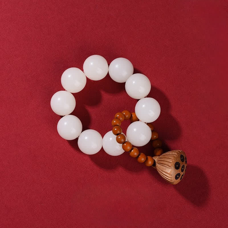 Buddha Stones Perles de méditation tactiles en bois de pêcher et gousse de lotus polies à la main, pour un ancrage optimal - Graine de Bodhi blanche (Pureté ♥ Méditation) - image 10