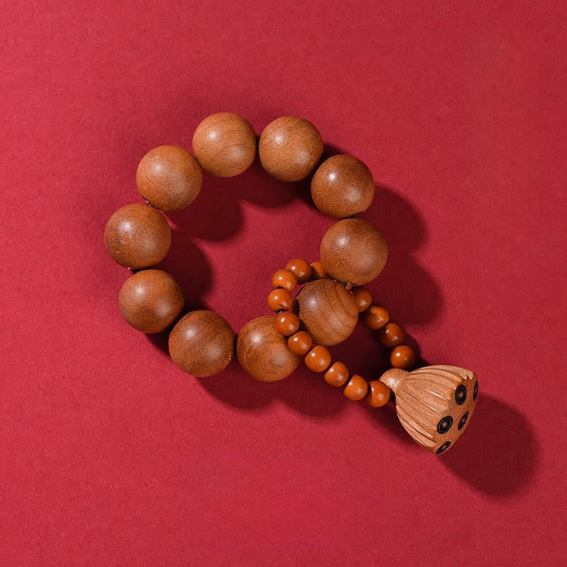 Buddha Stones Perles de méditation tactiles en bois de pêcher et gousse de lotus polies à la main, pour un ancrage optimal - Bois de pêcher (Protection ♥ Purification) - image 1