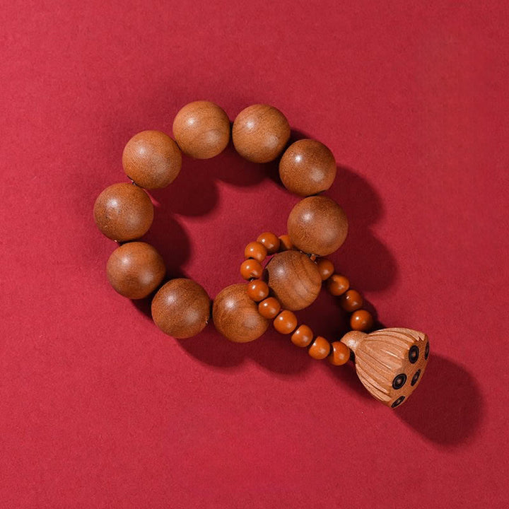Buddha Stones Perles de méditation tactiles en bois de pêcher et gousse de lotus polies à la main, pour un ancrage optimal - Bois de pêcher (Protection ♥ Purification) - image 1