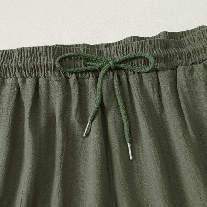 Short bermuda d'été décontracté à cordon de serrage, couleur unie, avec poches, motif Buddha Stones - image 11