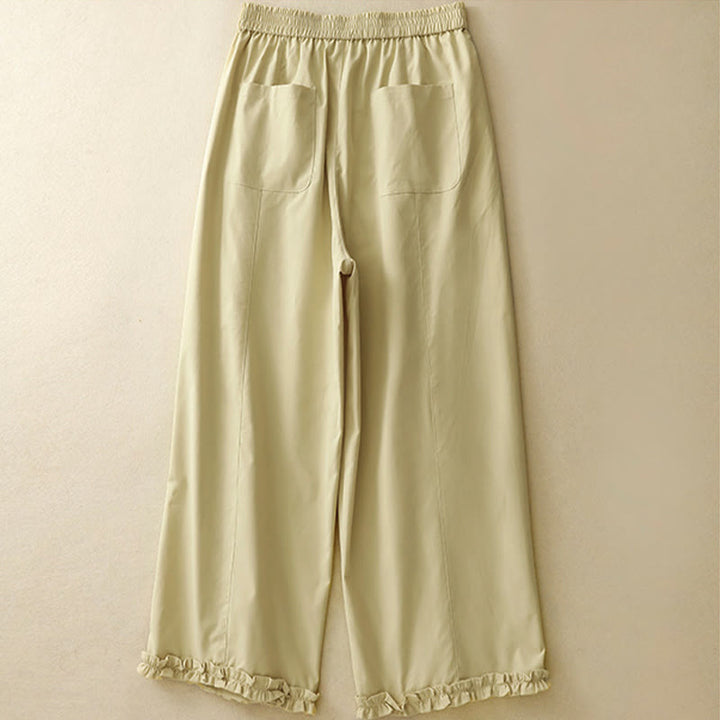 Buddha Stones Pantalon sarouel court d'été élégant et décontracté, à boutons, fermeture éclair et ourlet à volants, avec poches. - image 1