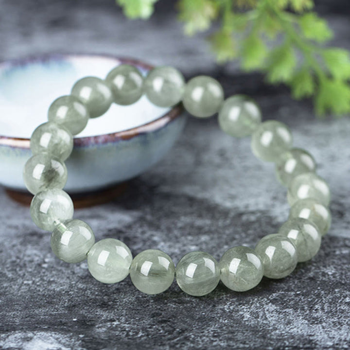 Bracelet de bénédiction et de richesse en cristal vert naturel Buddha Stones - image 1