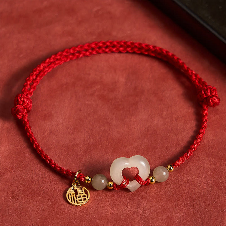 Buddha Stones Bague cœur en jade de Hetian, bracelet de protection Fu - Jade naturel (la couleur peut varier) - image 0