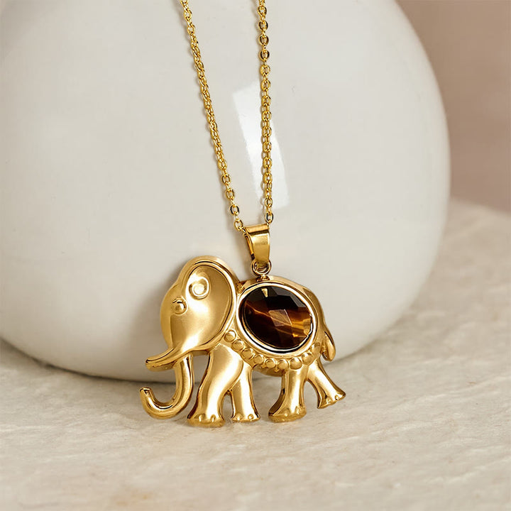 Buddha Stones Collier de protection éléphant en œil de tigre plaqué or - image 1