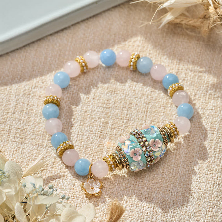 Buddha Stones Bracelet à perles rondes en quartz rose, calcédoine bleue et cuivre, pendentif fleur et bracelet à perles rondes « amour ». - image 1