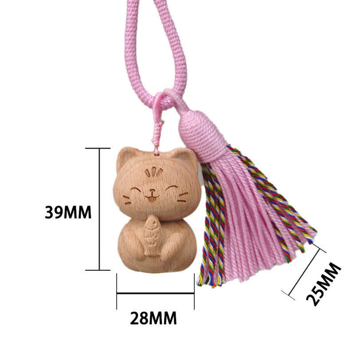 Buddha Stones Porte-clés porte-bonheur en bois clair sculpté à la main avec pompon chat, symbole d'ancrage - Chat rose mangeant du poisson - image 10