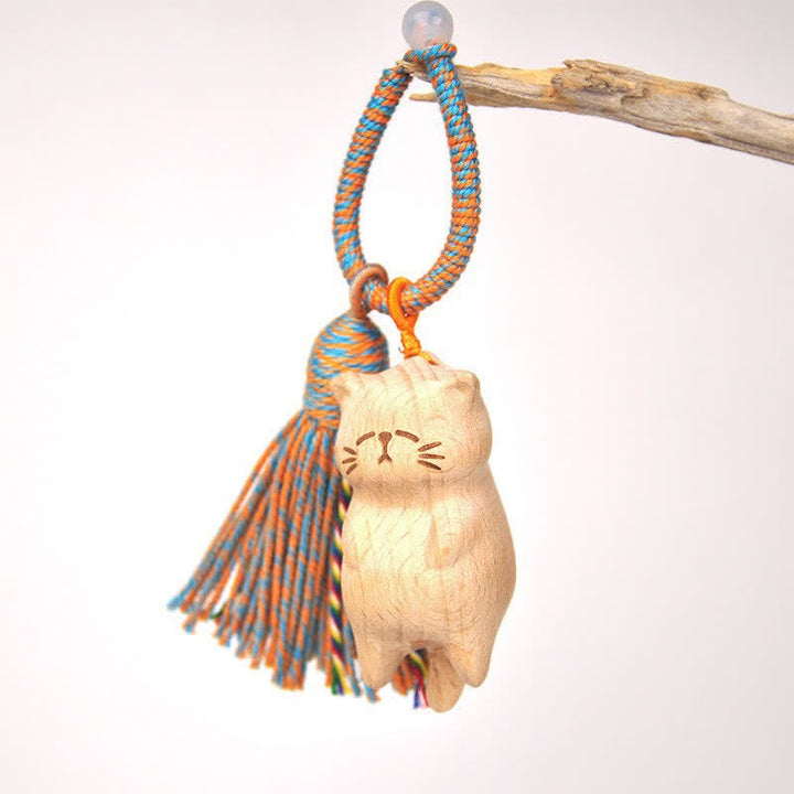 Buddha Stones Porte-clés porte-bonheur en bois clair sculpté à la main avec pompon chat, symbole d'ancrage - Chat bleu paresseux - image 25