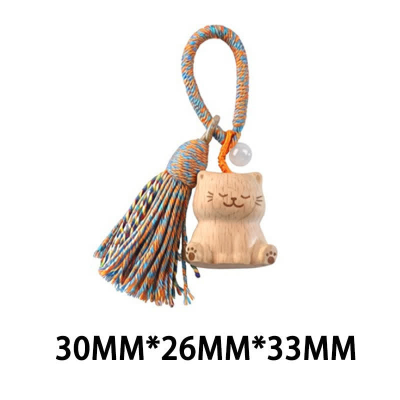 Buddha Stones Porte-clés porte-bonheur en bois clair sculpté à la main avec pompon chat, symbole d'ancrage - Chat bleu assis - image 39