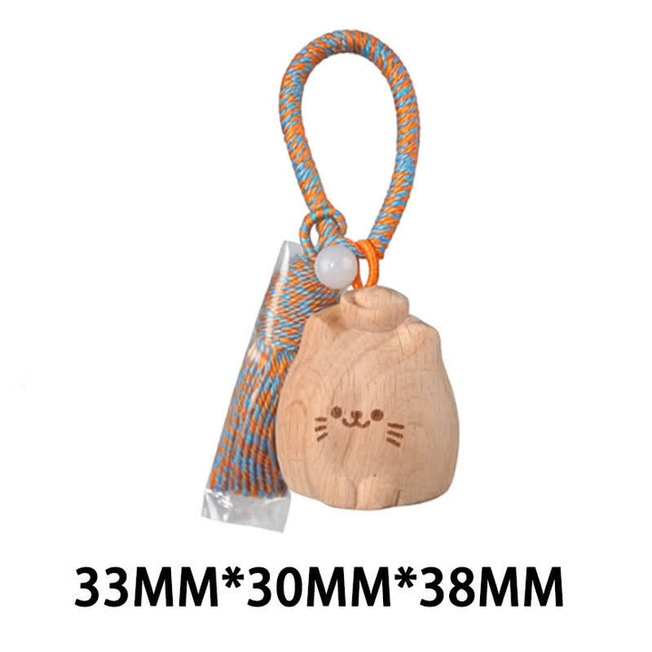 Buddha Stones Porte-clés porte-bonheur en bois clair sculpté à la main avec pompon chat, symbole d'ancrage - Chat en lingot bleu - image 32
