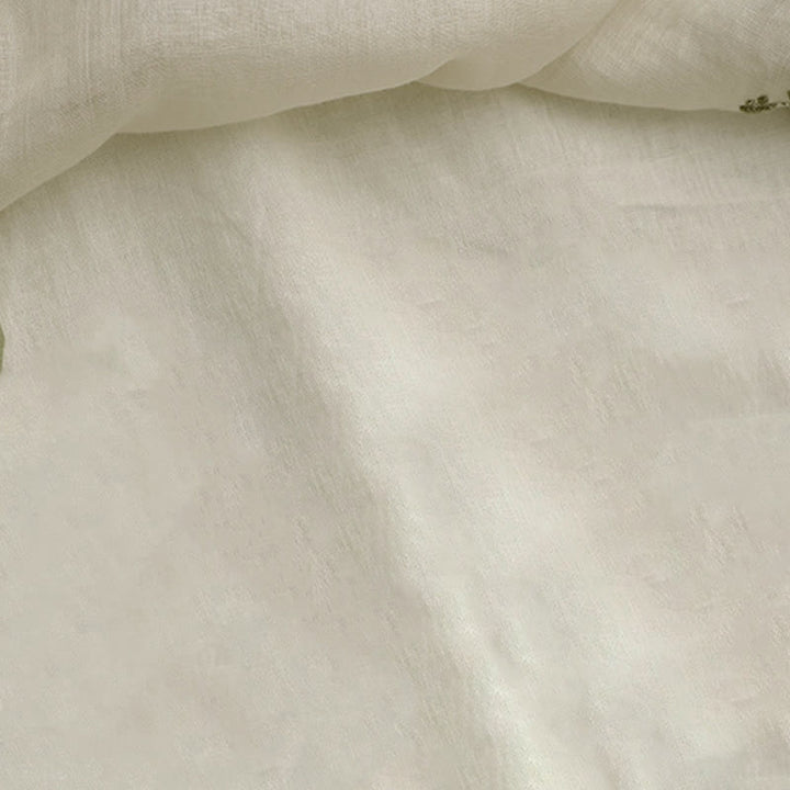 Chemise femme beige à manches trois-quarts, ornée de broderies florales et de feuilles vertes, avec motif de Buddha Stones - image 9