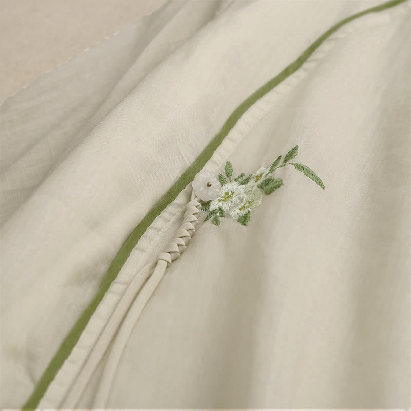 Chemise femme beige à manches trois-quarts, ornée de broderies florales et de feuilles vertes, avec motif de Buddha Stones - image 4