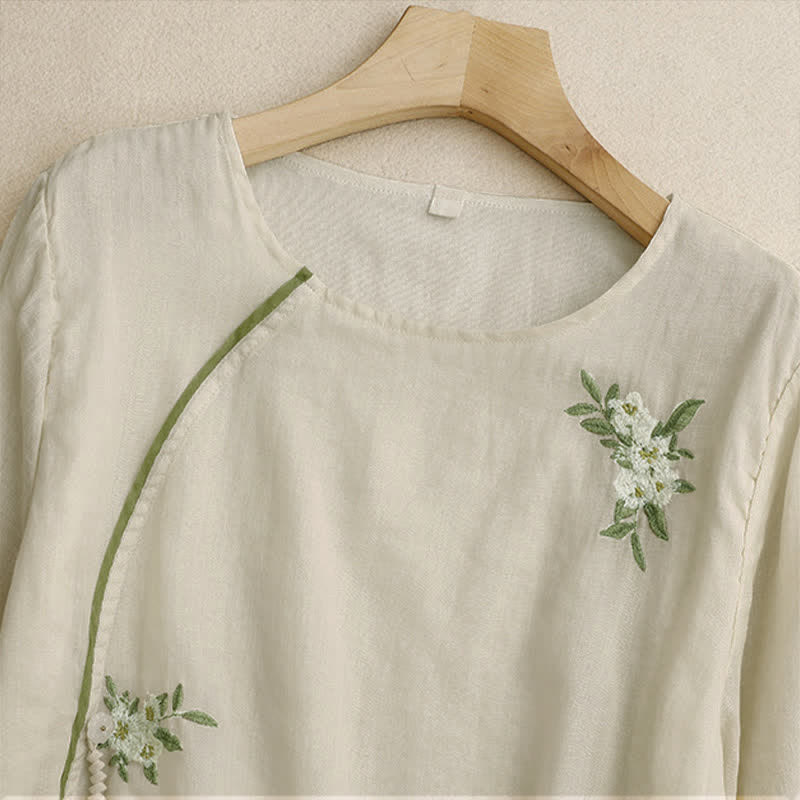 Chemise femme beige à manches trois-quarts, ornée de broderies florales et de feuilles vertes, avec motif de Buddha Stones - image 2