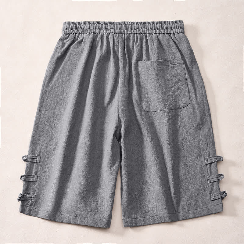 Buddha Stones Short d'été minimaliste décontracté pour homme, à cordon de serrage, couleur unie, avec boutons brandebourg décoratifs sur le côté et poches. - image 1