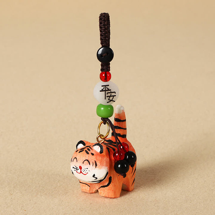 Buddha Stones Porte-clés en bois sculpté représentant un tigre Om Mani Padme Hum - Tigre sûr - image 1