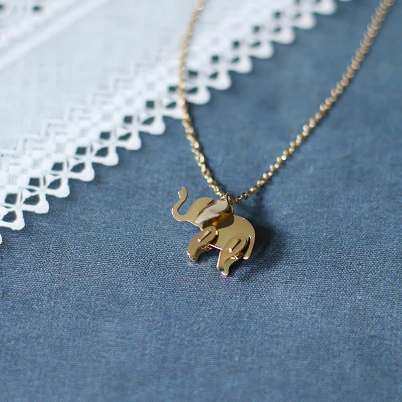 Collier porte-bonheur en acier titane avec pendentif éléphant
