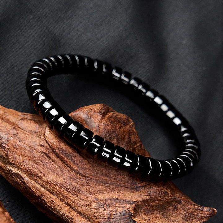 Buddha Stones Bracelet de force en obsidienne noire naturelle à facettes et à perles droites - image 1