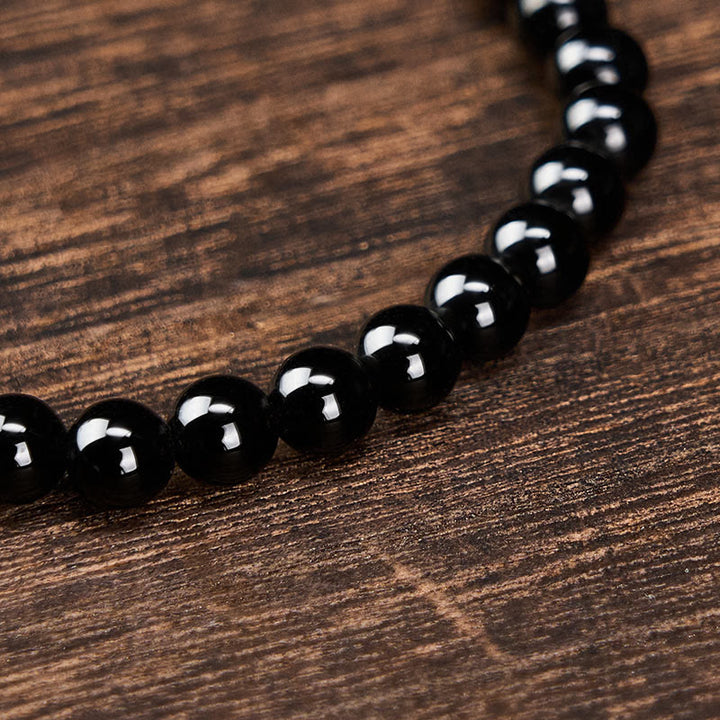 Buddha Stones Bracelet minimaliste de protection en obsidienne noire et tourmaline noire, perles rondes. - image 4