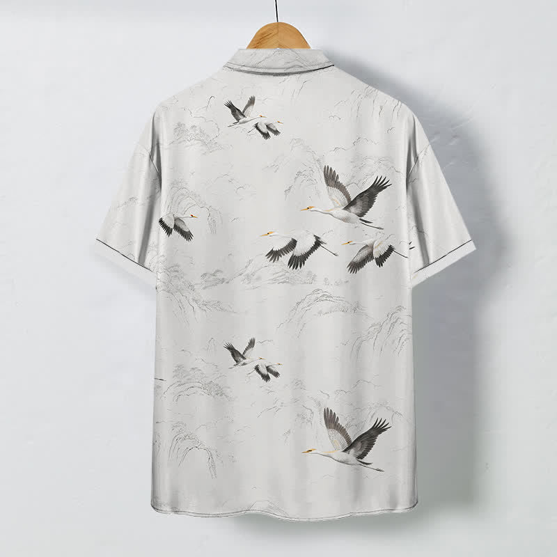 Buddha Stones Chemise à manches courtes respirante pour homme, motif grues et chaînes de montagnes, avec boutons. - image 1