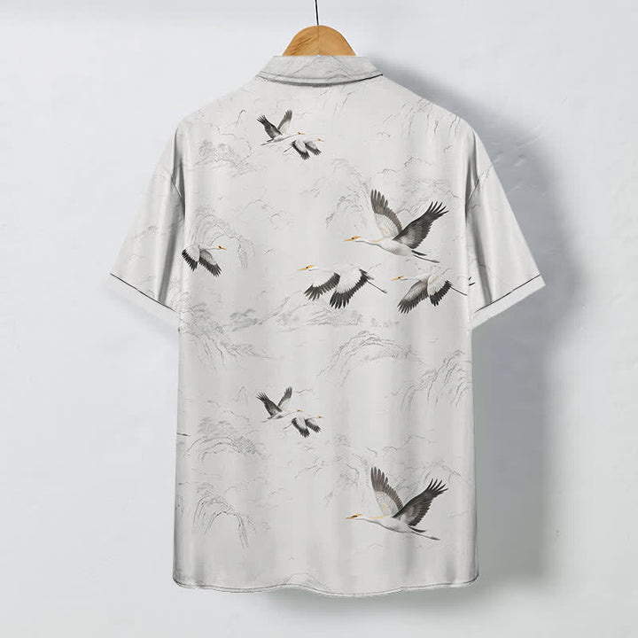 Buddha Stones Chemise à manches courtes respirante pour homme, motif grues et chaînes de montagnes, avec boutons. - image 1