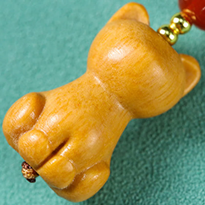 Buddha Stones Porte-clés de purification en bois de santal sculpté à la main, représentant un poisson-chat - image 3