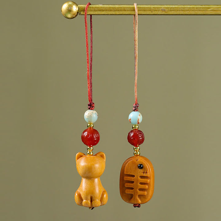 Buddha Stones Porte-clés de purification en bois de santal sculpté à la main, représentant un poisson-chat - image 0