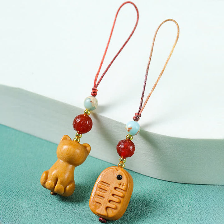 Buddha Stones Porte-clés de purification en bois de santal sculpté à la main, représentant un poisson-chat - image 9