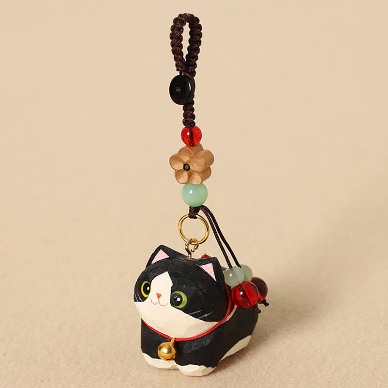 Buddha Stones Porte-clés de paix Om Mani Padme Hum en bois naturel sculpté à la main représentant un chat couché - Fleur de prunier Chat Noir - image 3