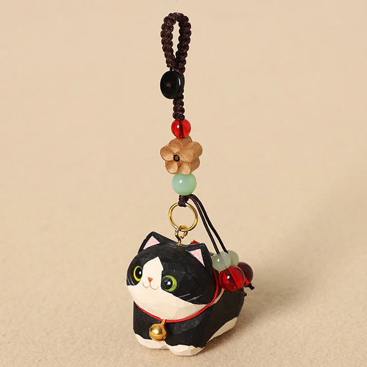 Buddha Stones Porte-clés de paix Om Mani Padme Hum en bois naturel sculpté à la main représentant un chat couché - Fleur de prunier Chat Noir - image 3