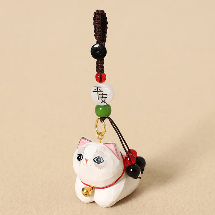 Buddha Stones Porte-clés de paix Om Mani Padme Hum en bois naturel sculpté à la main représentant un chat couché - Paix du Chat Blanc - image 9