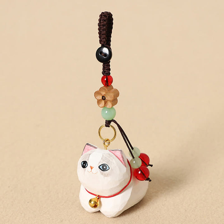 Buddha Stones Porte-clés de paix Om Mani Padme Hum en bois naturel sculpté à la main représentant un chat couché - Chat blanc Fleur de prunier - image 8